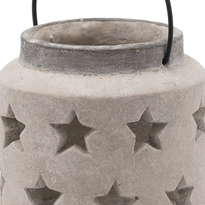 Concrete lantern with star cutouts on a white background