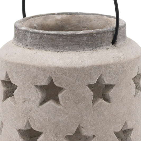 Concrete lantern with star cutouts on a white background