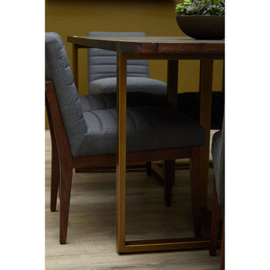 Dining table with chairs in a room setting