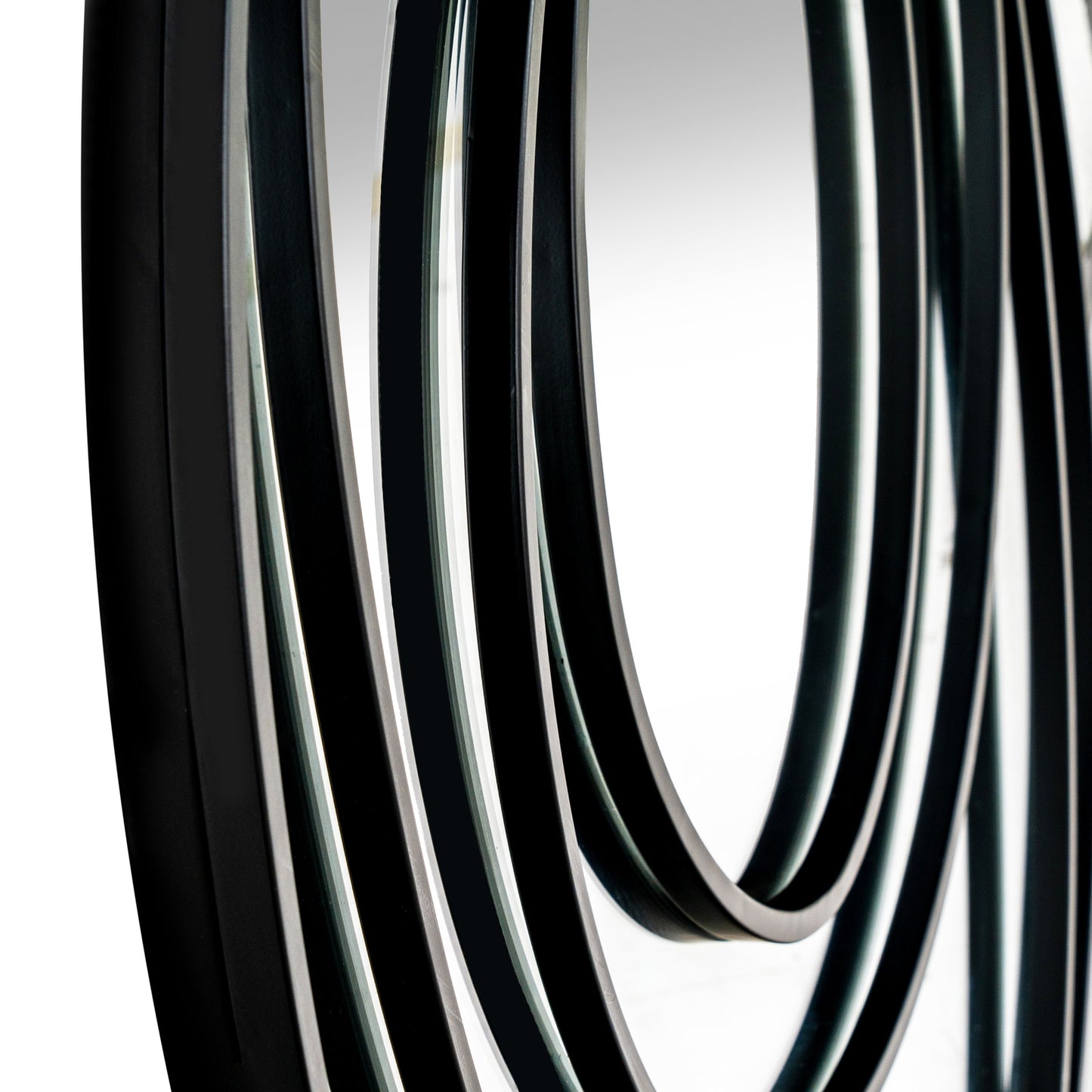 Close-up of black rubber hose on a white background