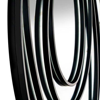 Close-up of black rubber hose on a white background