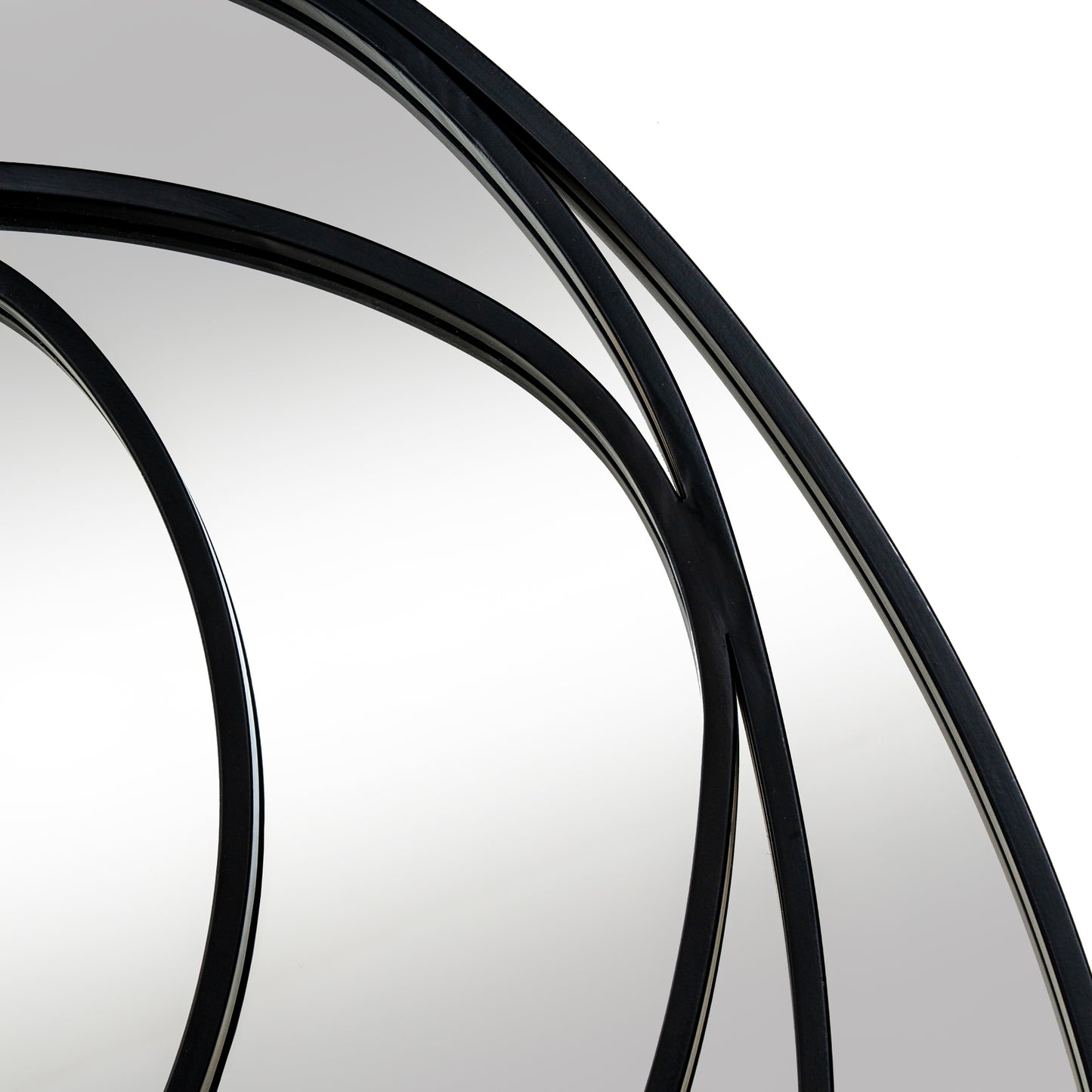Close-up of black bicycle tires on a white background