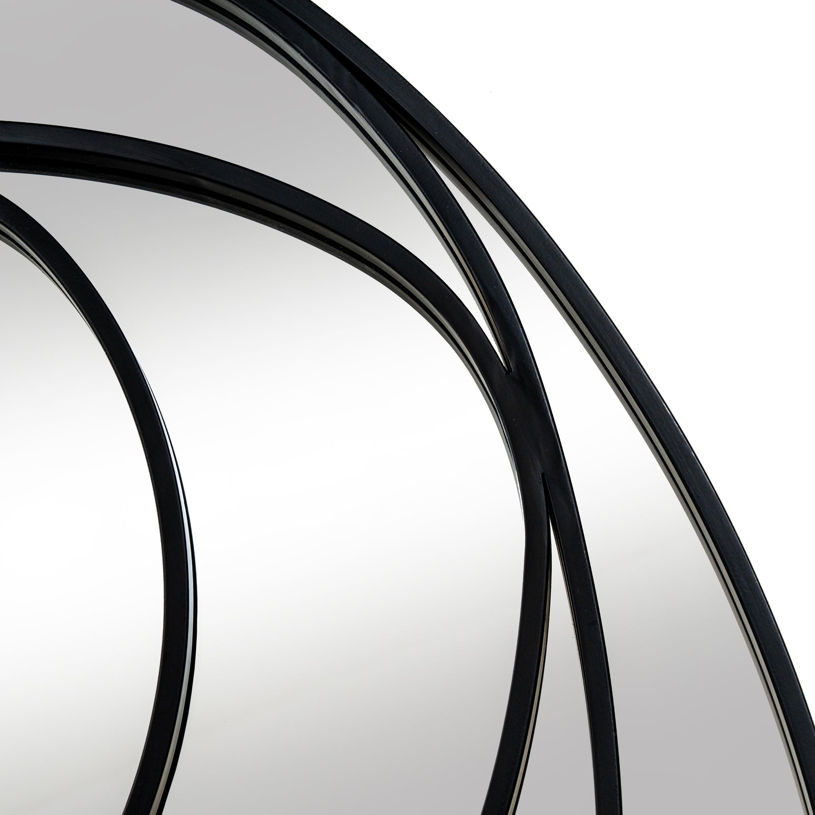 Close-up of black bicycle tires on a white background