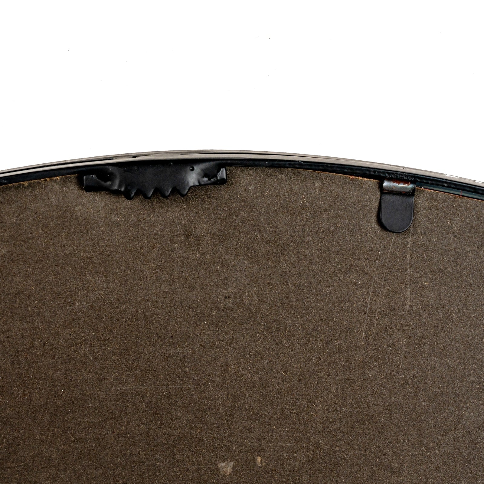 Close-up of a brown leather product with black hardware on a white background