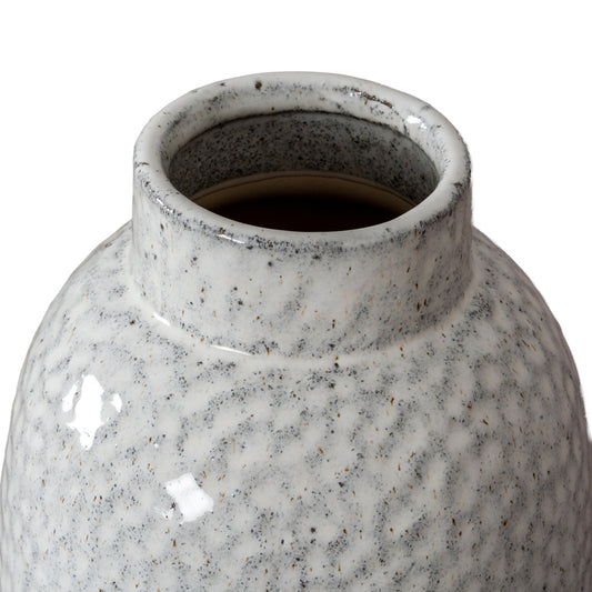 Speckled gray ceramic vase on a white background