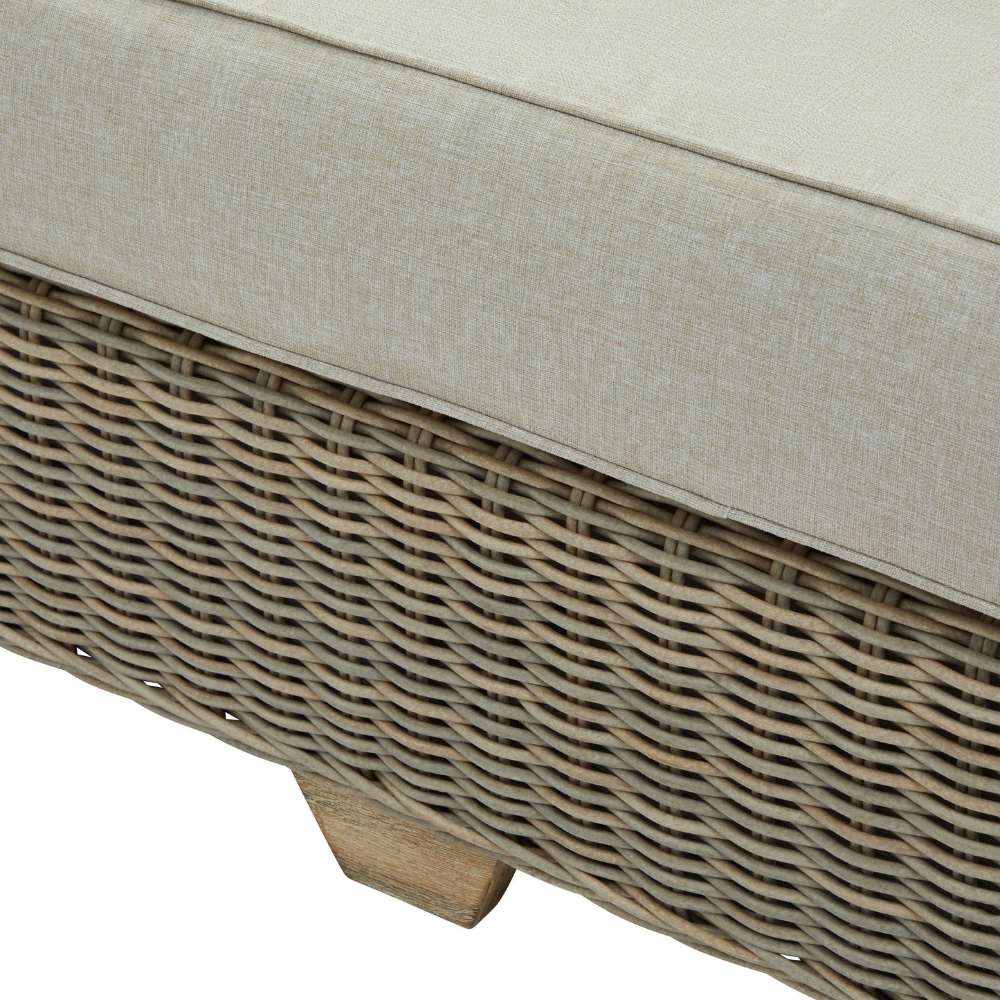 Wicker outdoor furniture with beige cushion on a white background