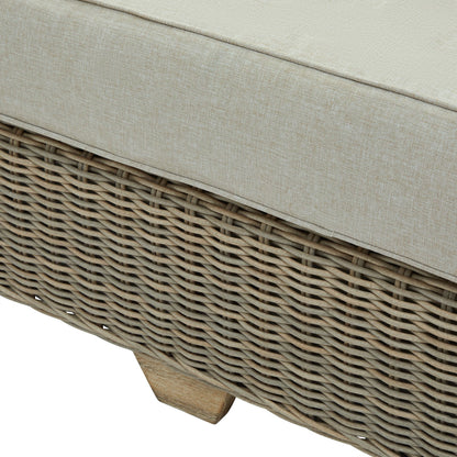 Wicker outdoor furniture with beige cushion on a white background