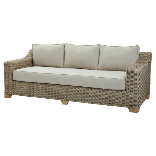 Wicker outdoor sofa with beige cushions on a white background
