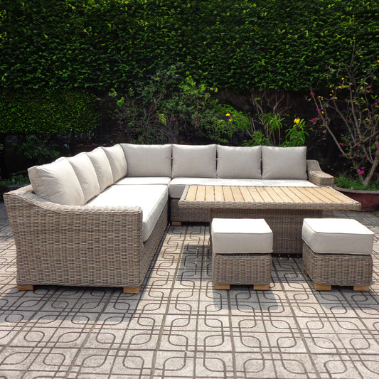 Outdoor patio furniture set with a sectional sofa and ottomans on a patterned patio.