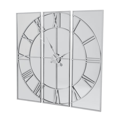 Triptych wall clock with glass panels on a white background