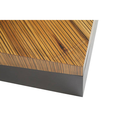 Close-up of a wooden surface with a black base on a white background