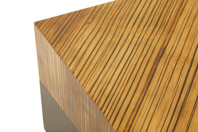 Close-up of a wooden surface with a zebra wood pattern