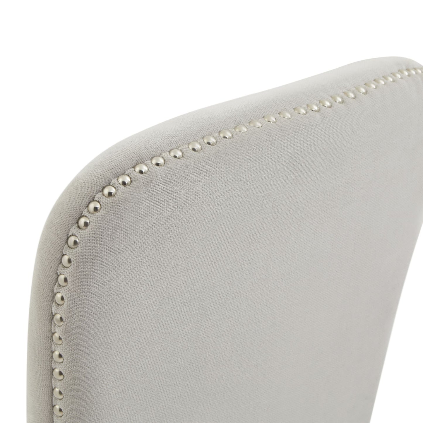 Gray chair with decorative nailhead trim on a white background