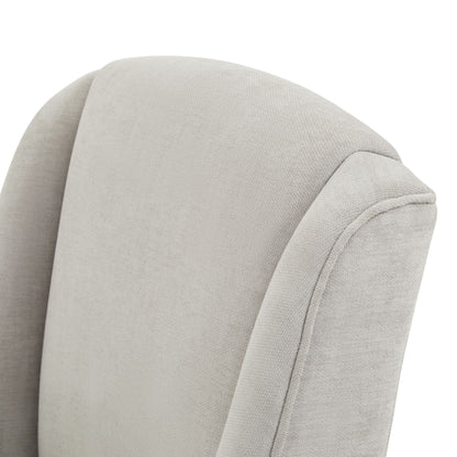 Close-up of a light gray upholstered chair armrest on a white background