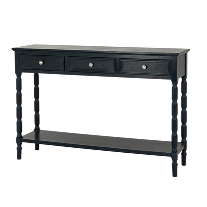 Black console table with three drawers and a shelf on a white background