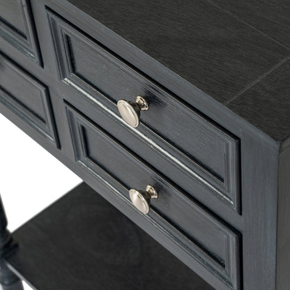 Close-up of a dark gray dresser with silver knobs on a white background