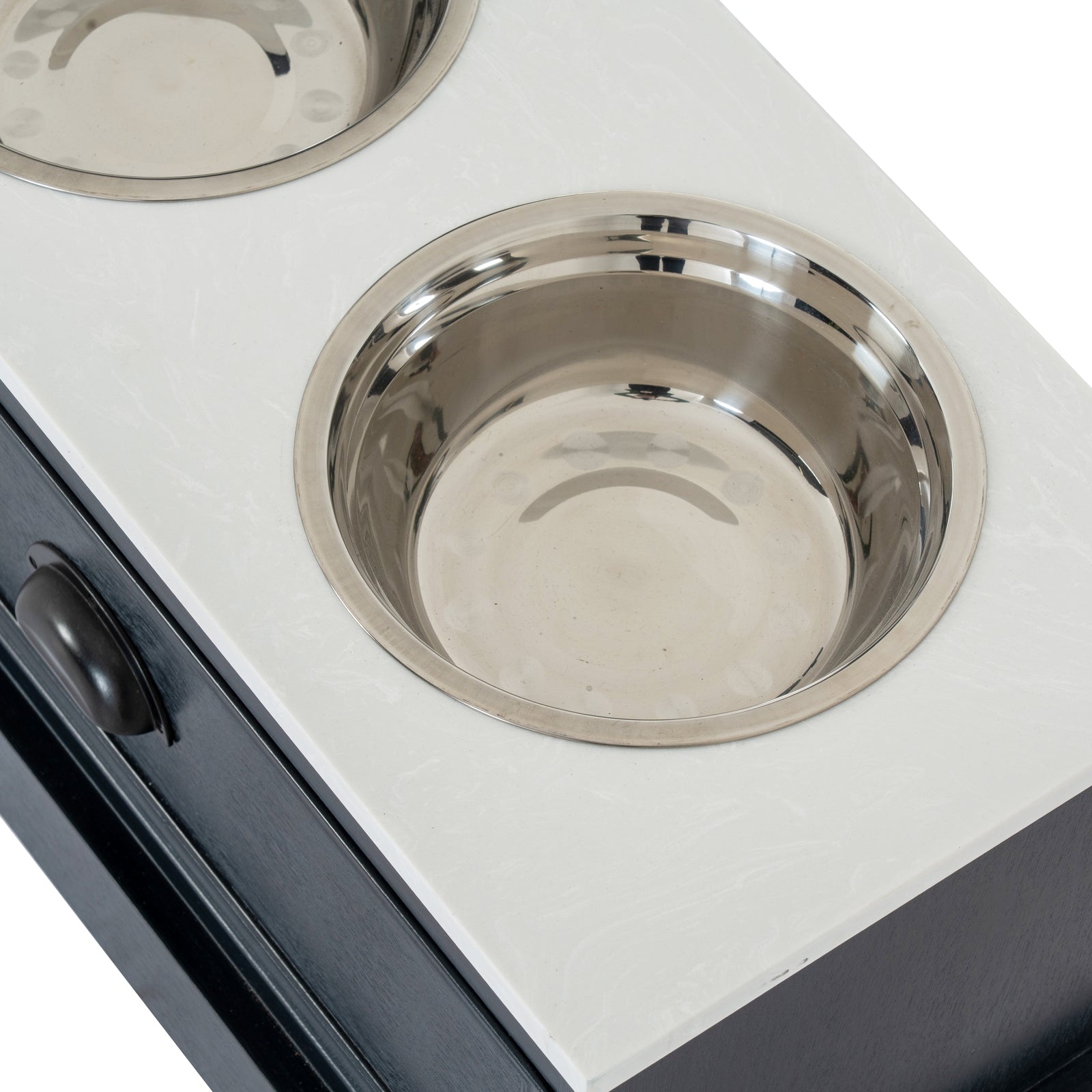Stainless steel pet bowl on a white surface