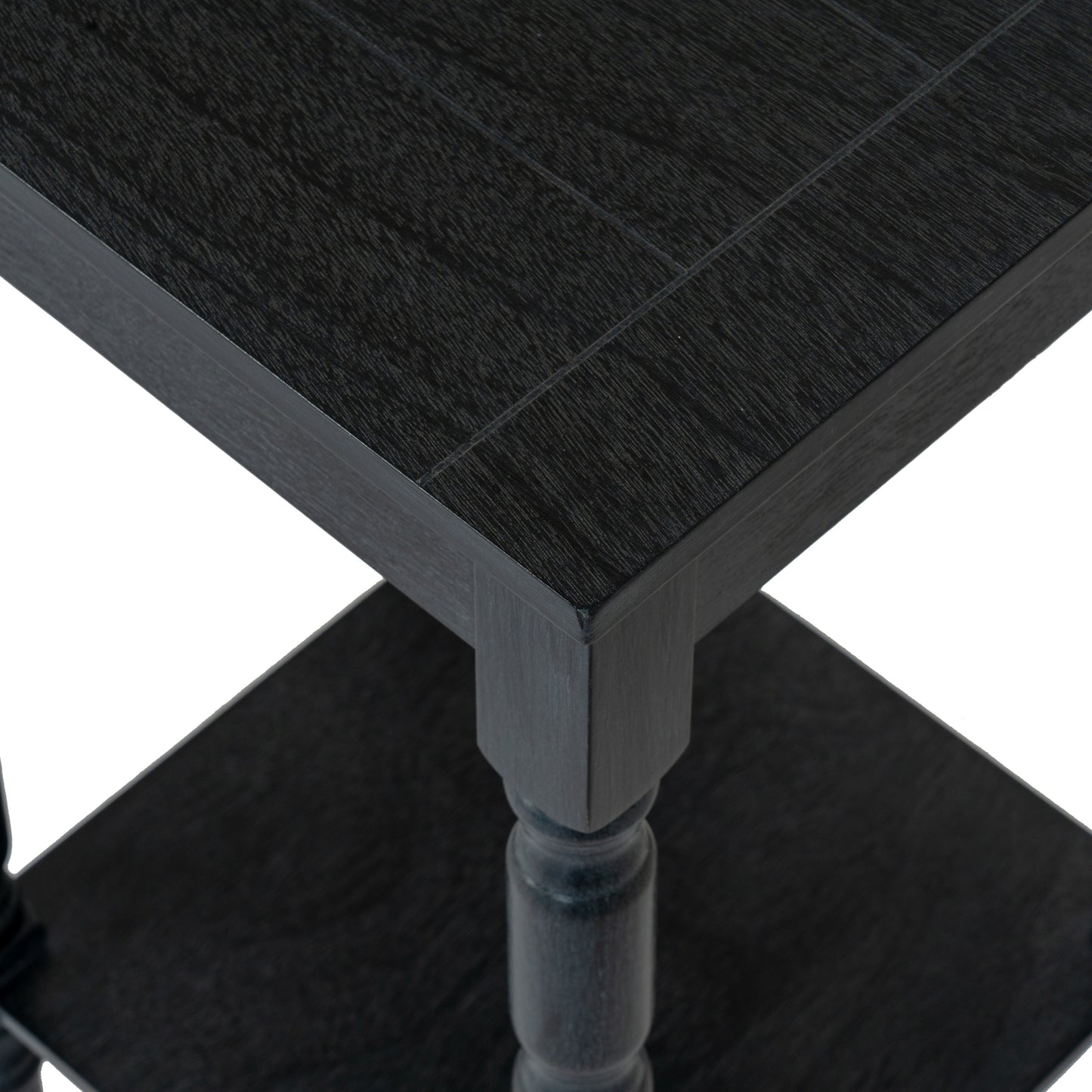 Close-up of a black wooden table with a white background