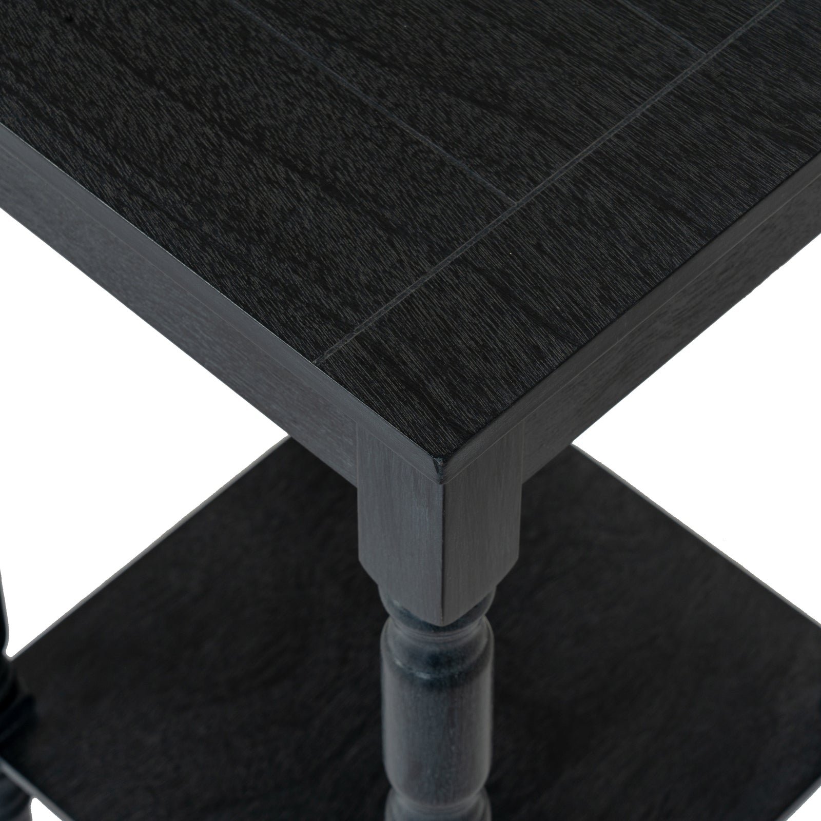 Close-up of a black wooden table with a white background