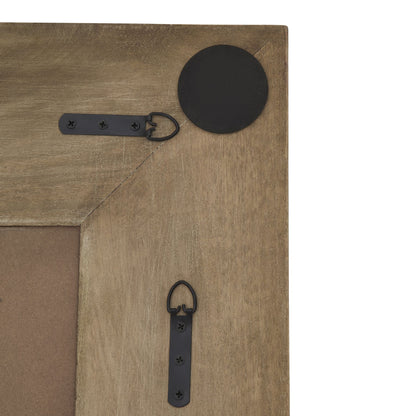 Wooden surface with black leather straps and circular object