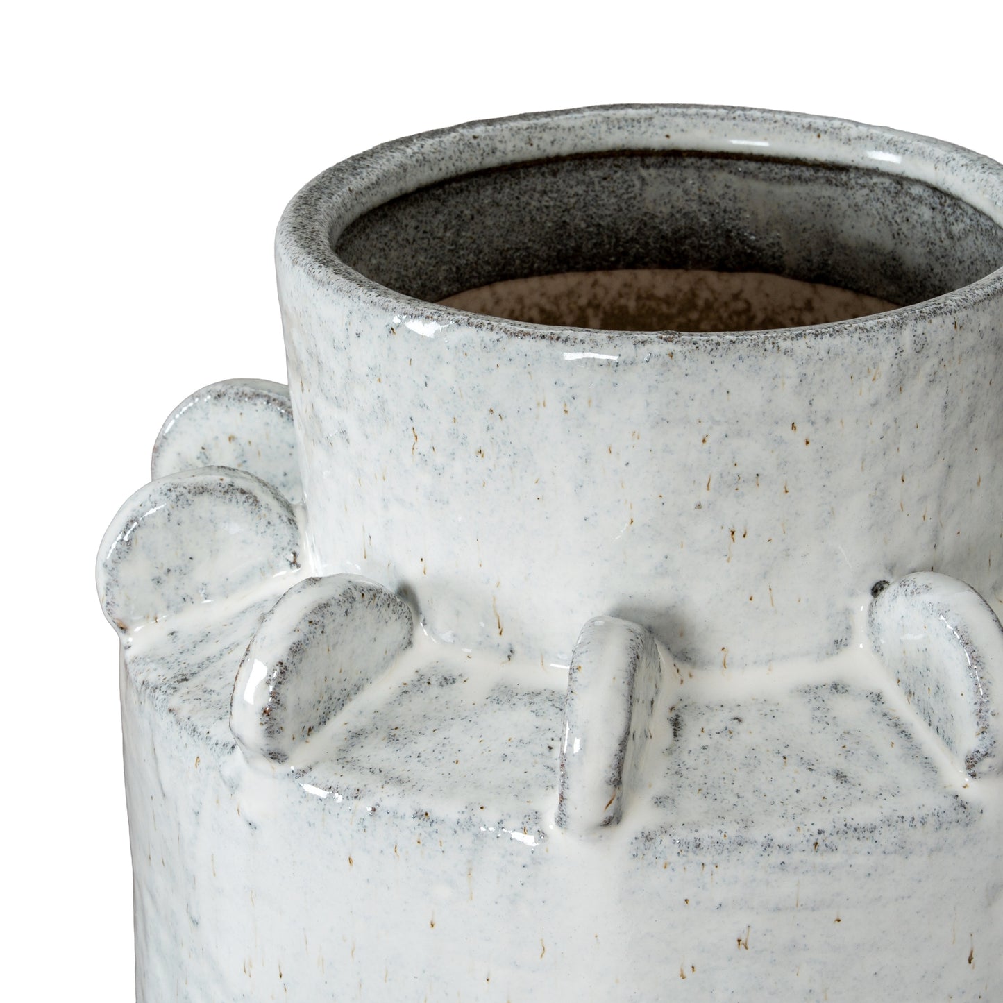 Close-up of a textured ceramic vase with a white and gray speckled design.