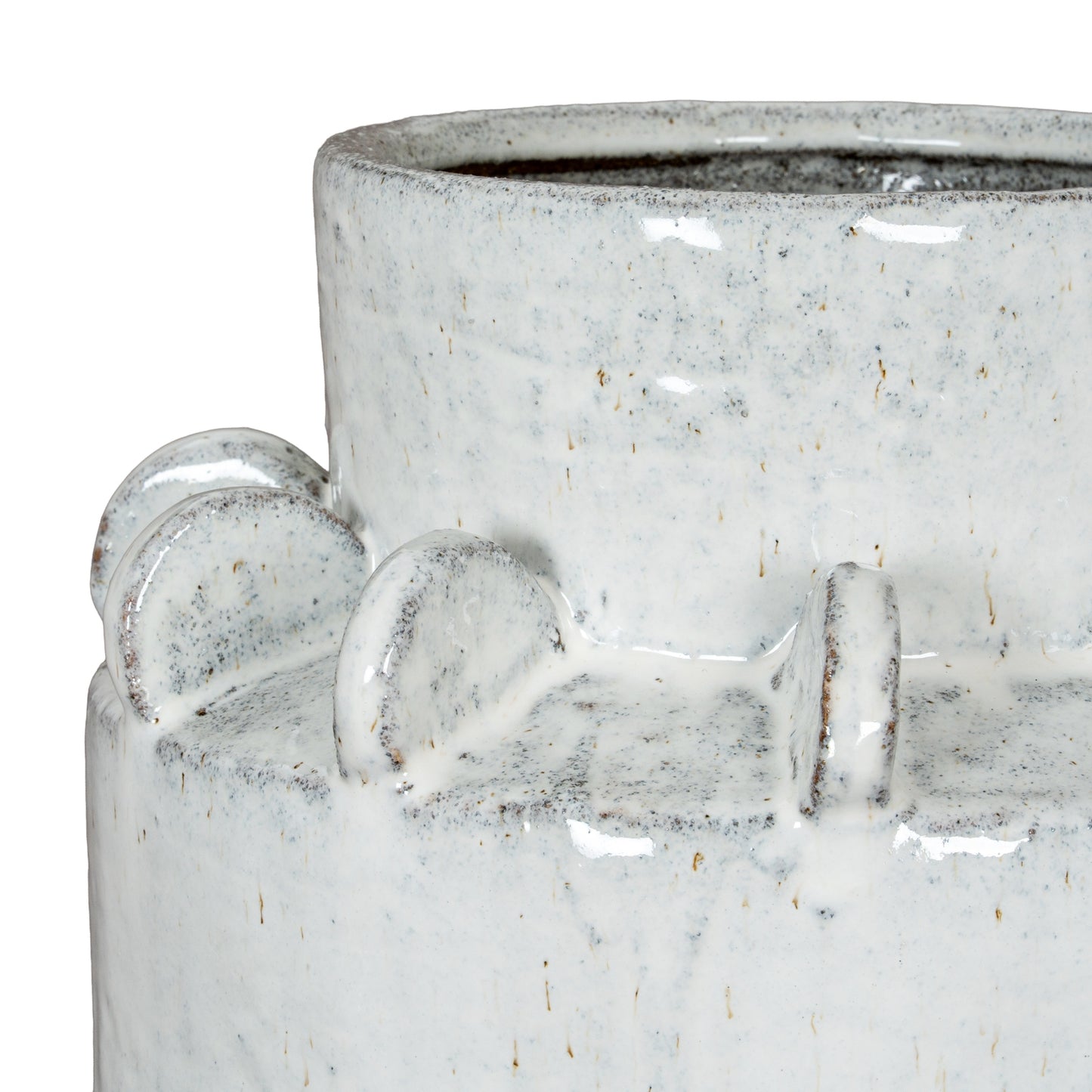 Close-up of a textured ceramic vase with decorative elements on a white background