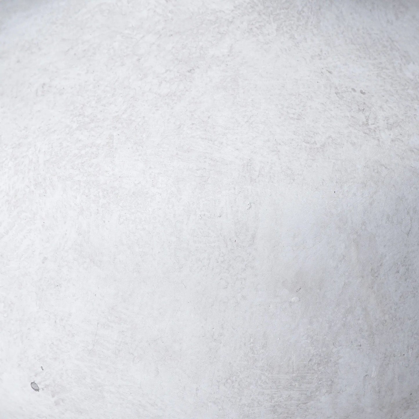 Close-up of a textured white surface
