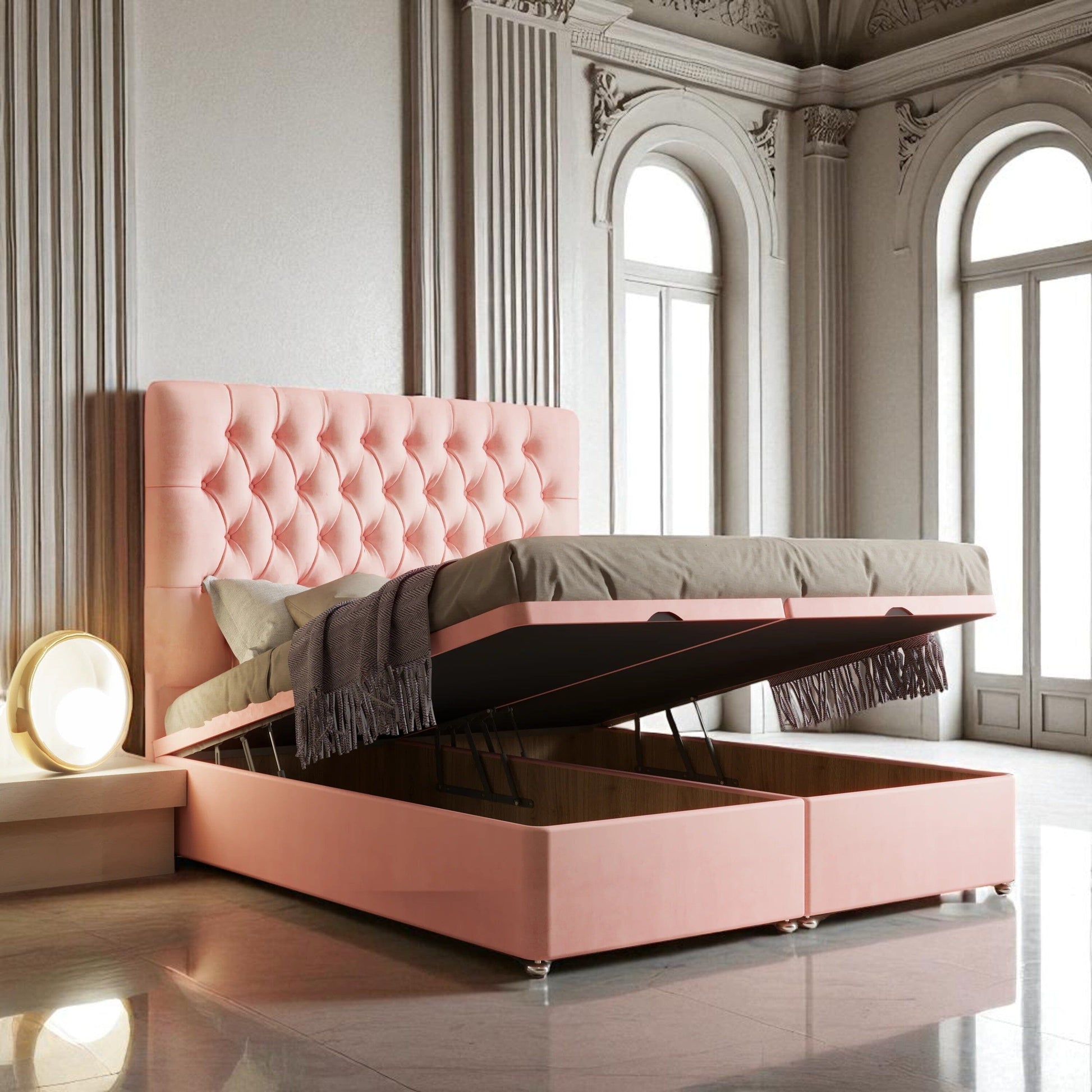 Pink upholstered bed with storage compartment in a stylish room.