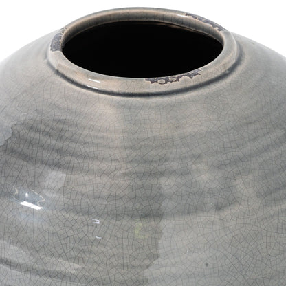 Gray ceramic vase with textured surface on a white background