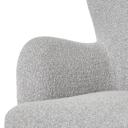 Close-up of a textured gray chair armrest on a white background