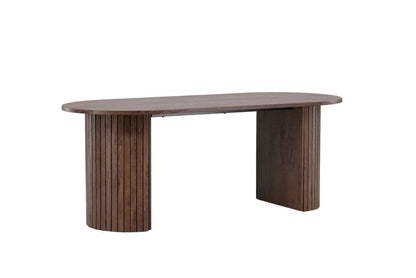 Wooden dining table with cylindrical legs on a white background