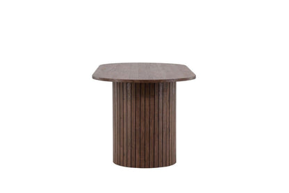 Wooden side table with a hexagonal top on a white background