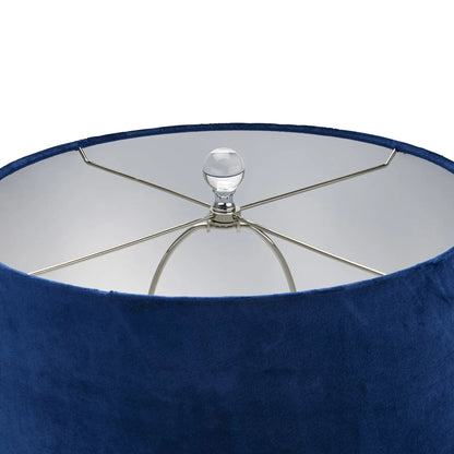 Close-up of a blue lampshade with a metallic stand on a white background