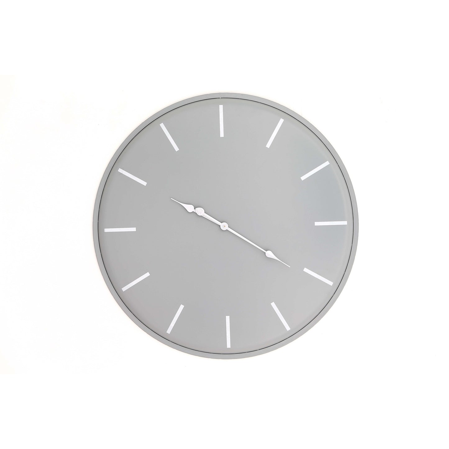Round wall clock with gray face and white hour markers on a white background