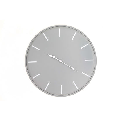 Round wall clock with gray face and white hour markers on a white background