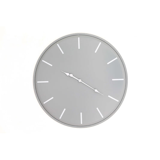 Round wall clock with gray face and white hour markers on a white background