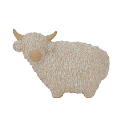 Decorative sheep figurine with textured wool on a white background