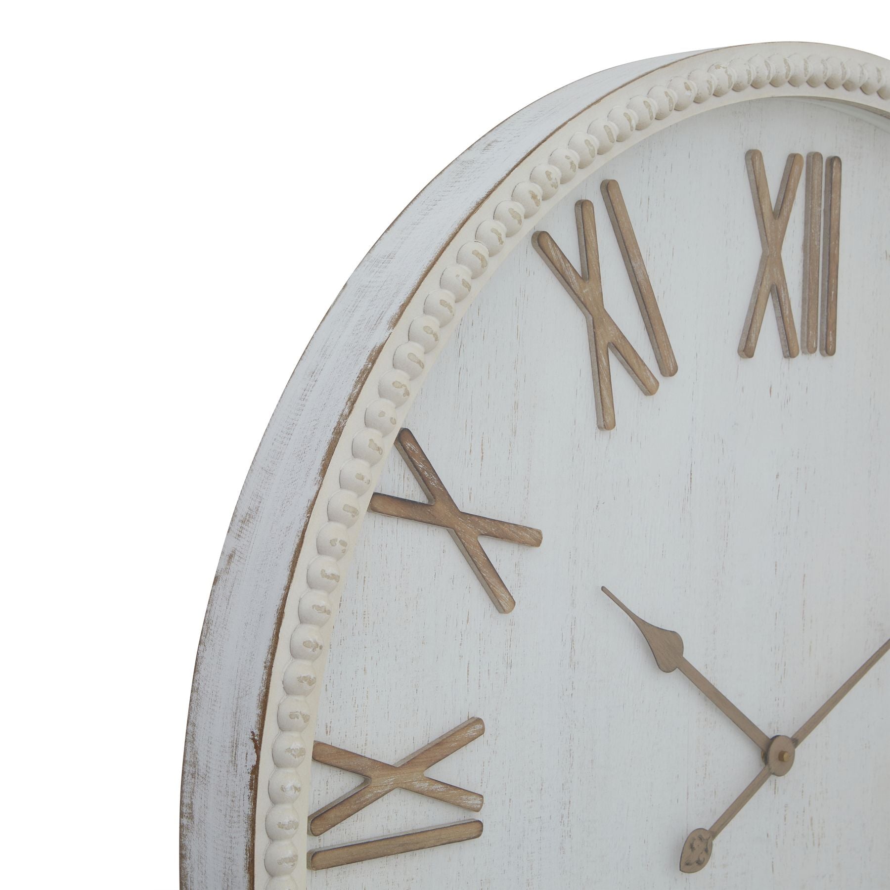 White wall clock with gold Roman numerals on a white background