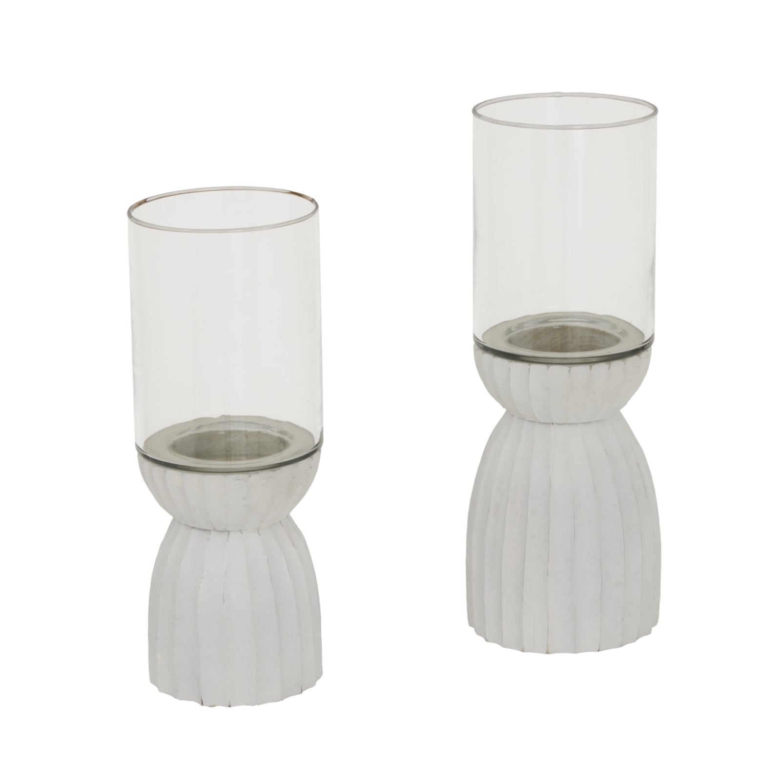 Two glass candle holders with ribbed metal bases on a white background