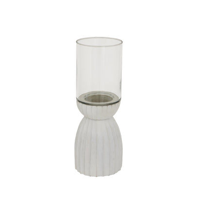 Decorative candle holder with ribbed base and clear glass on a white background