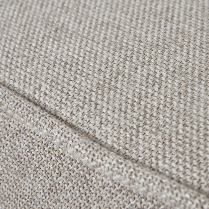 Close-up of beige fabric texture with a diagonal line