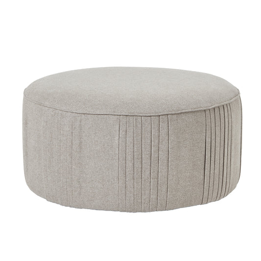 Round gray ottoman with pleated design on a white background