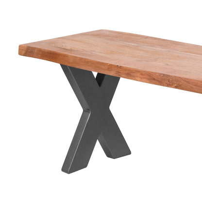 Wooden table with X-shaped metal legs on a white background