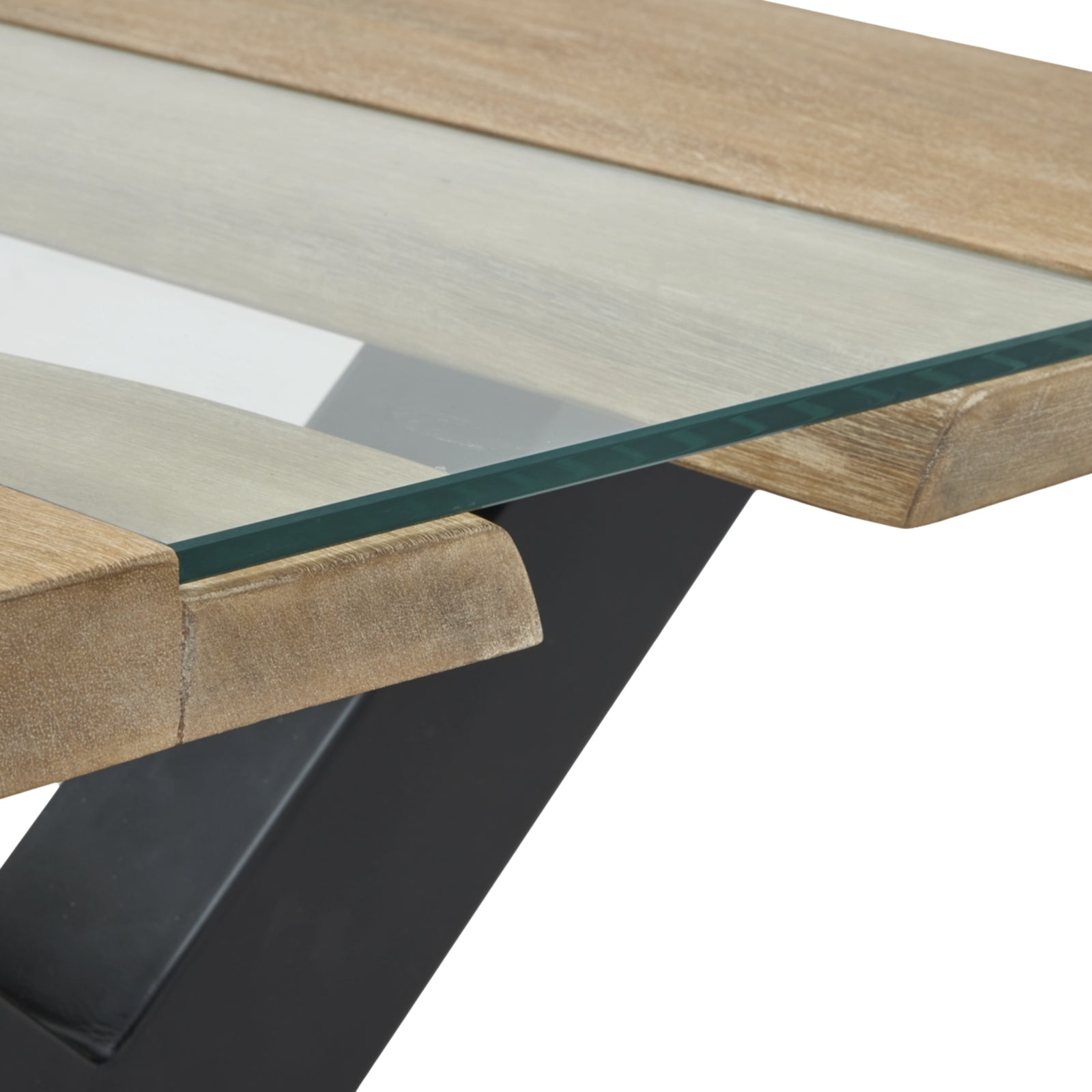 Glass-top dining table with wooden frame and black metal legs on a white background