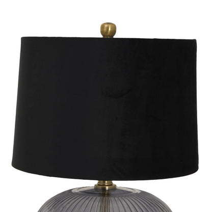Black lampshade with a gold fixture on a white background