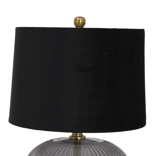 Black lampshade with a gold fixture on a white background