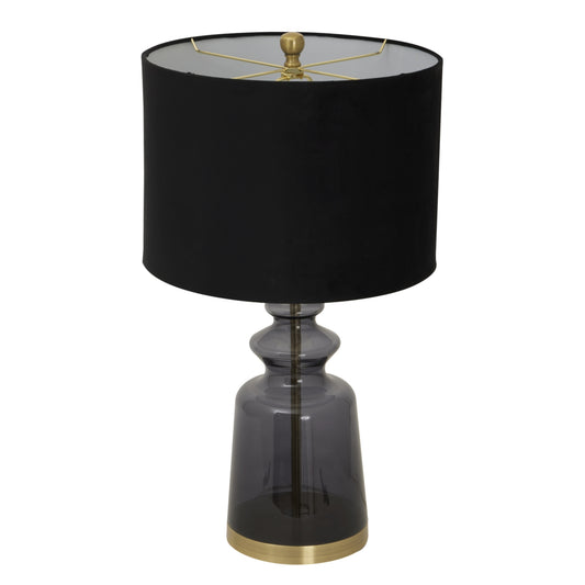 Table lamp with black shade and smoked glass base on a white background