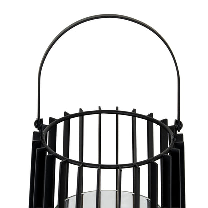 Black metal lantern with a handle on a white background
