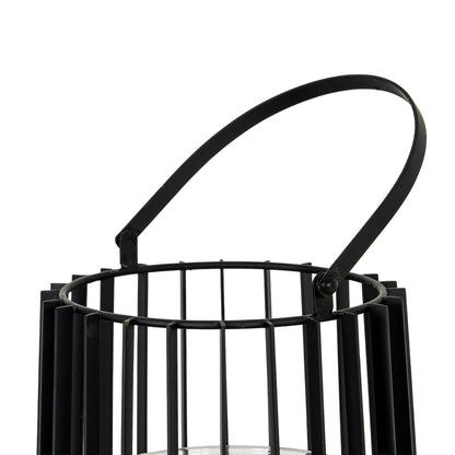Black metal lantern with handle on a white background