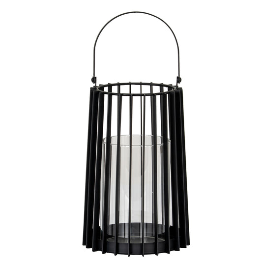 Black metal lantern with a clear glass container on a white background